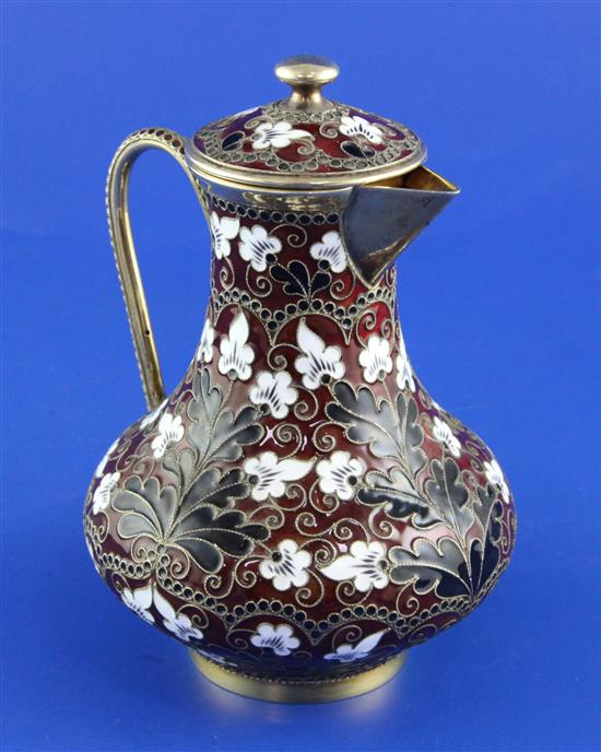 A mid 20th century Soviet Russian 88 zolotnik silver gilt and cloisonne enamel baluster jug and cover, gross 13.5 oz.